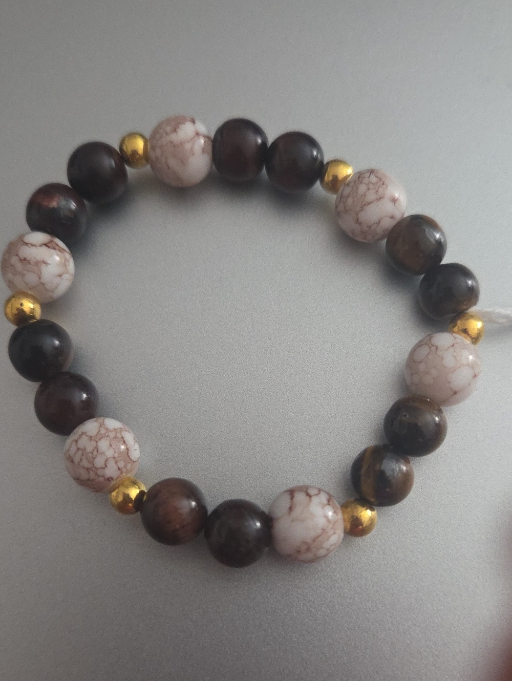 White and Brown Beaded Stretch Bracelet with Gold Accents